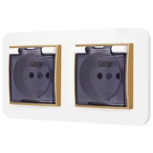 Dwa gniazda hermetyczne do łazienki z ramką zaokrągloną seria MINI kolor biały mat/złoty