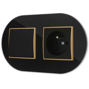 Włącznik pojedynczy z gniazdem pojedynczym z ramką okrągłą efekt szkła seria ICON kolor czarny/złoty