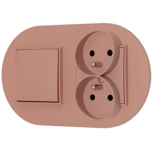 Włącznik pojedynczy z gniazdem podwójnym z ramką okrągłą seria MINI kolor łososiowy